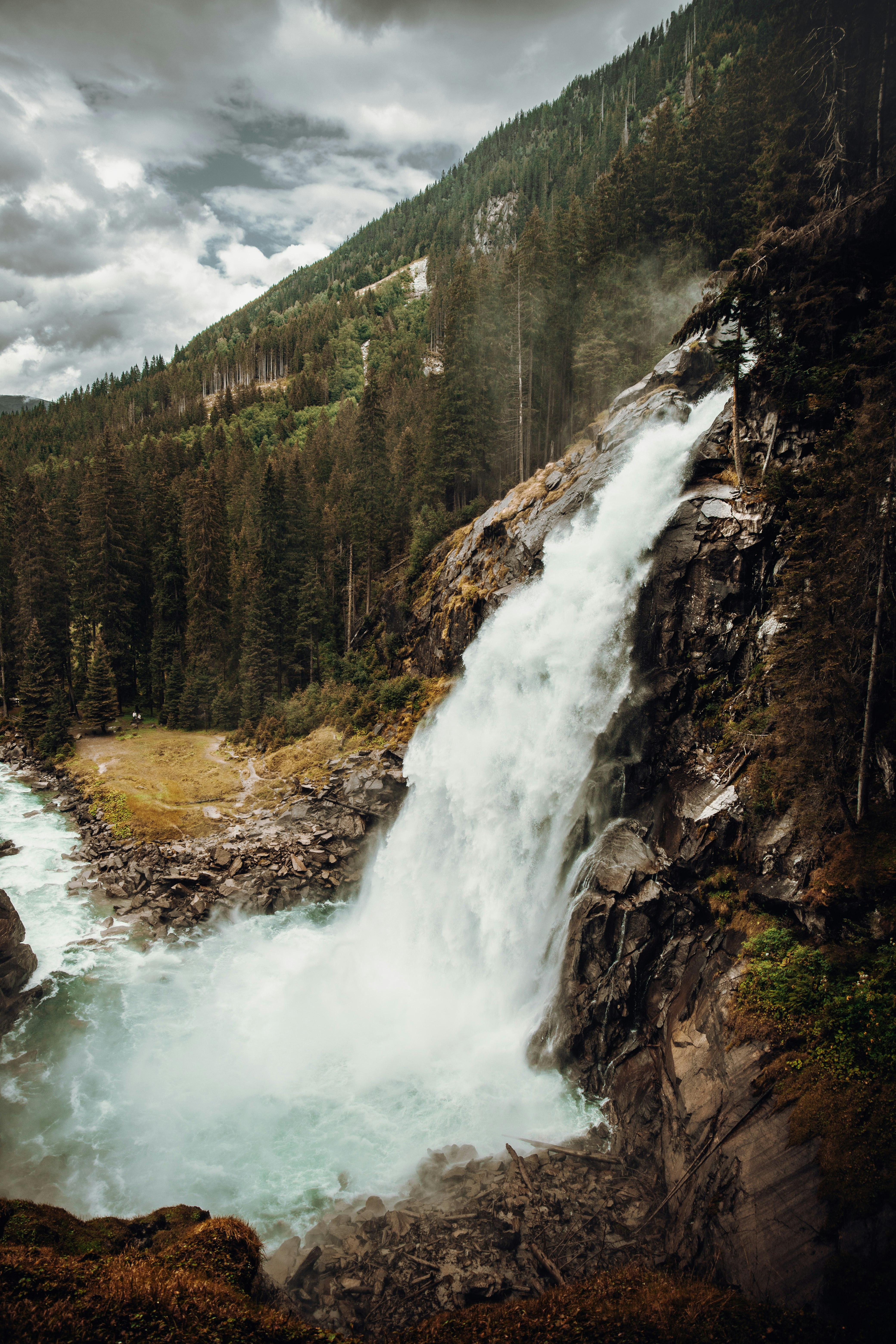 waterfalls in the middle of the forest